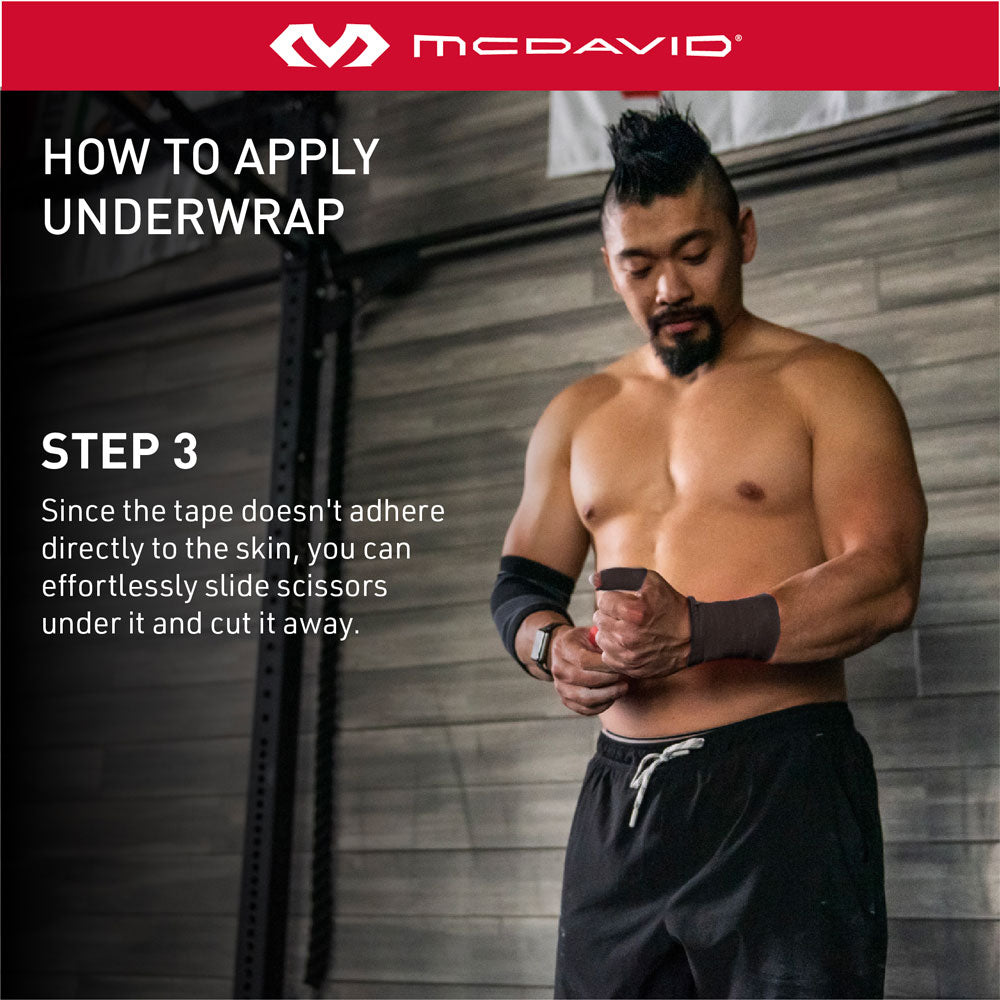 How to Apply Underwrap  - Step 3: Since the tape doesn't adhere directly to the skin, you can effortlessly slide scissors under it and cut it away.