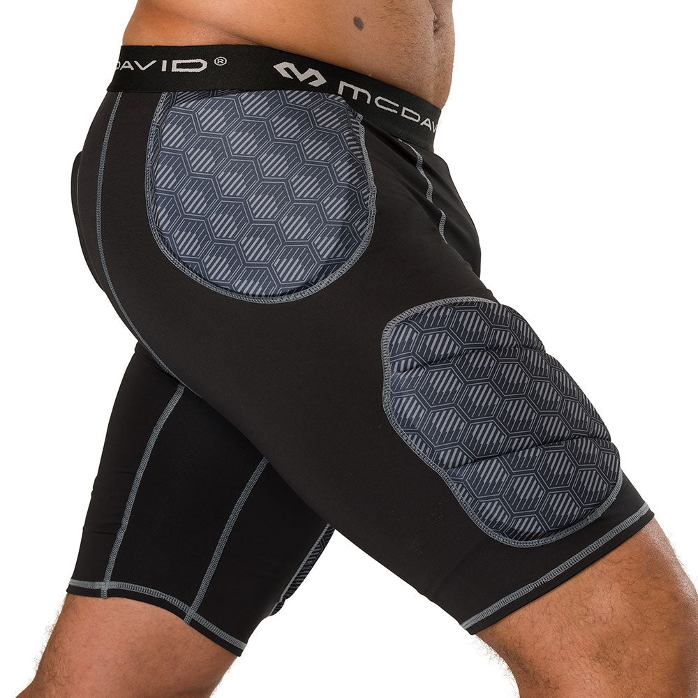 McDavid Rival Integrated 5-Pad Girdle in black, three-quarter side view on model showing hip and thigh pad placement