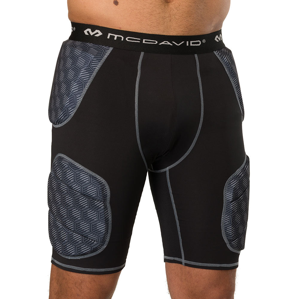 McDavid Rival Integrated 5-Pad Girdle in black, front view on model showing padded girdle fit