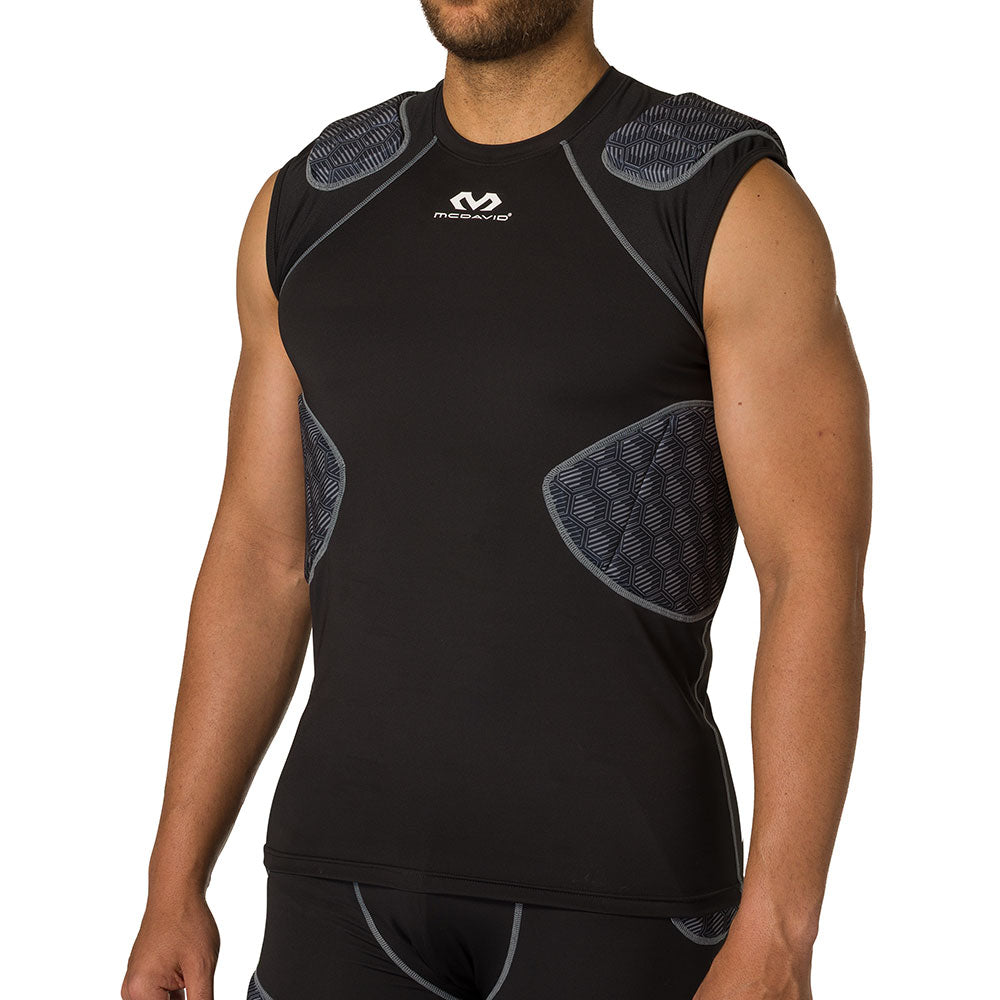 McDavid Rival 5-Pad Integrated Compression Shirt in black, three-quarter front view on model showing shoulder and rib pad fit