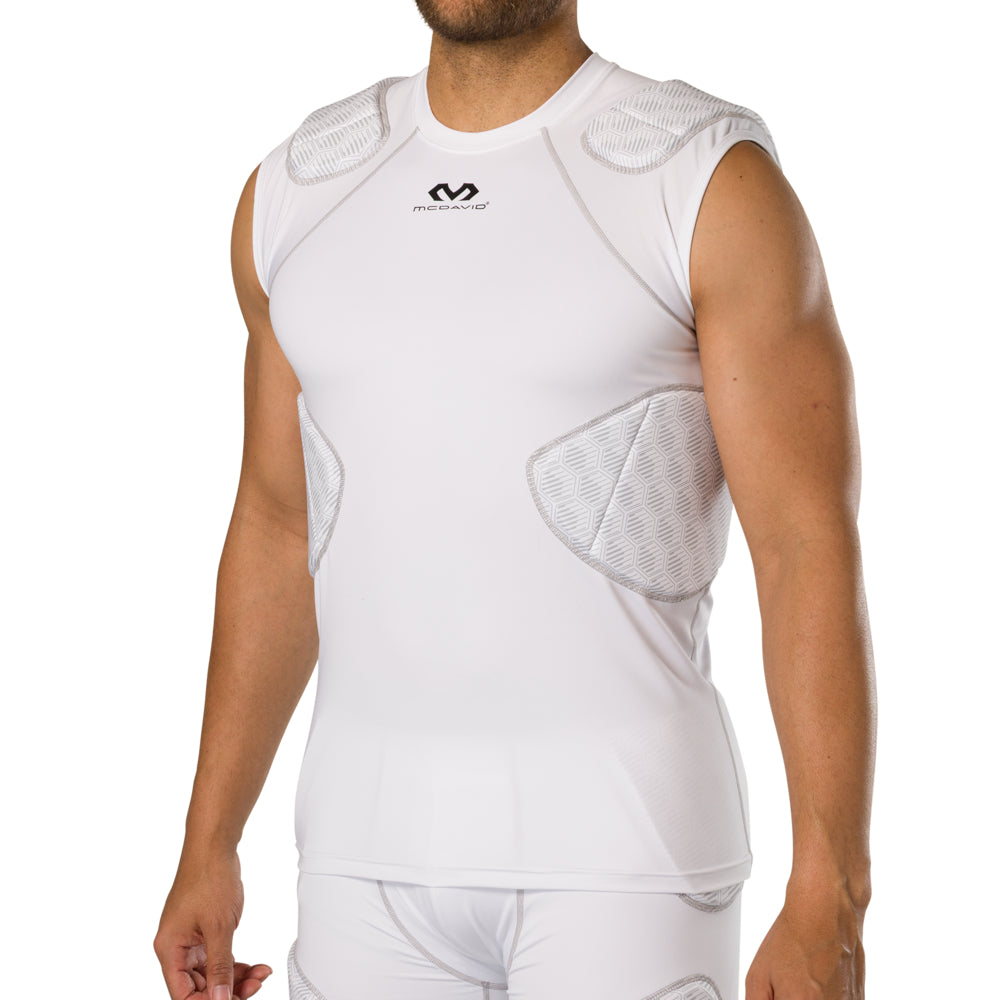McDavid Rival 5-Pad Integrated Compression Shirt in white, three-quarter front view on model showing shoulder and rib pad fit