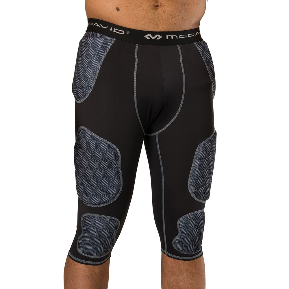 McDavid Rival Integrated 7-Pad ¾ Tight in black, front view on model showing padded tight fit
