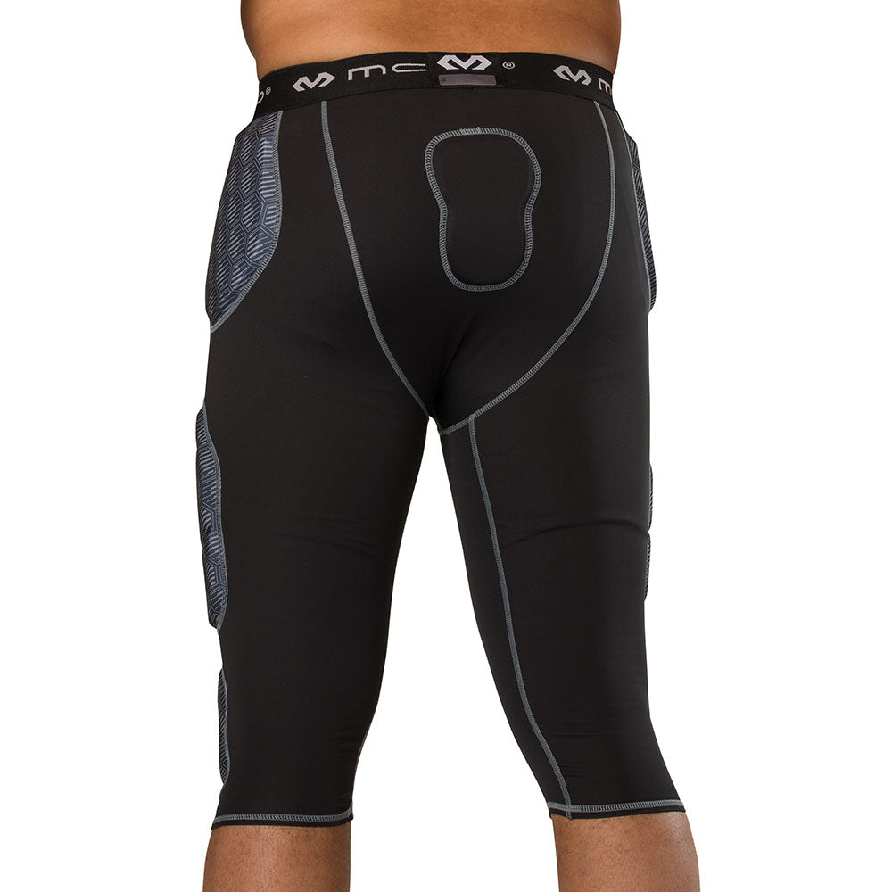 McDavid Rival Integrated 7-Pad ¾ Tight in black, back view on model showing tailbone pad and hip padding fit