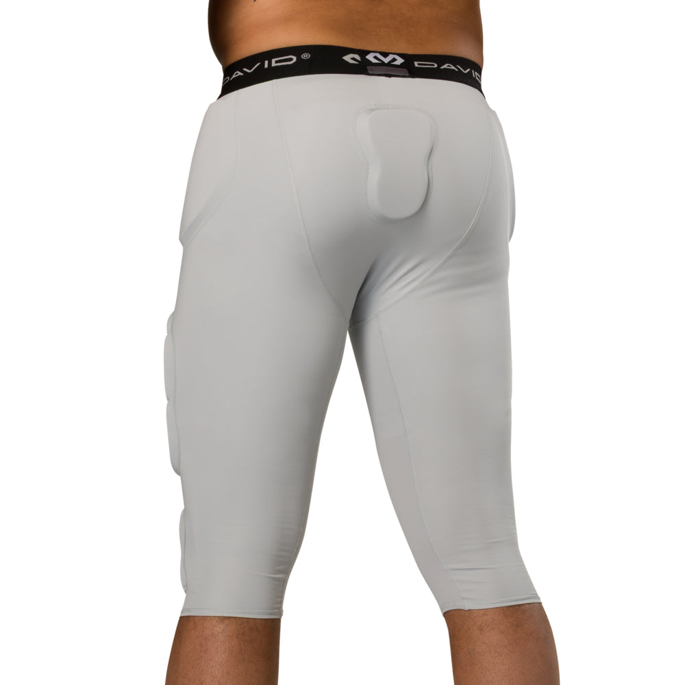 McDavid Rival Integrated 7-Pad ¾ Tight in grey, back view on model showing tailbone pad and hip padding fit