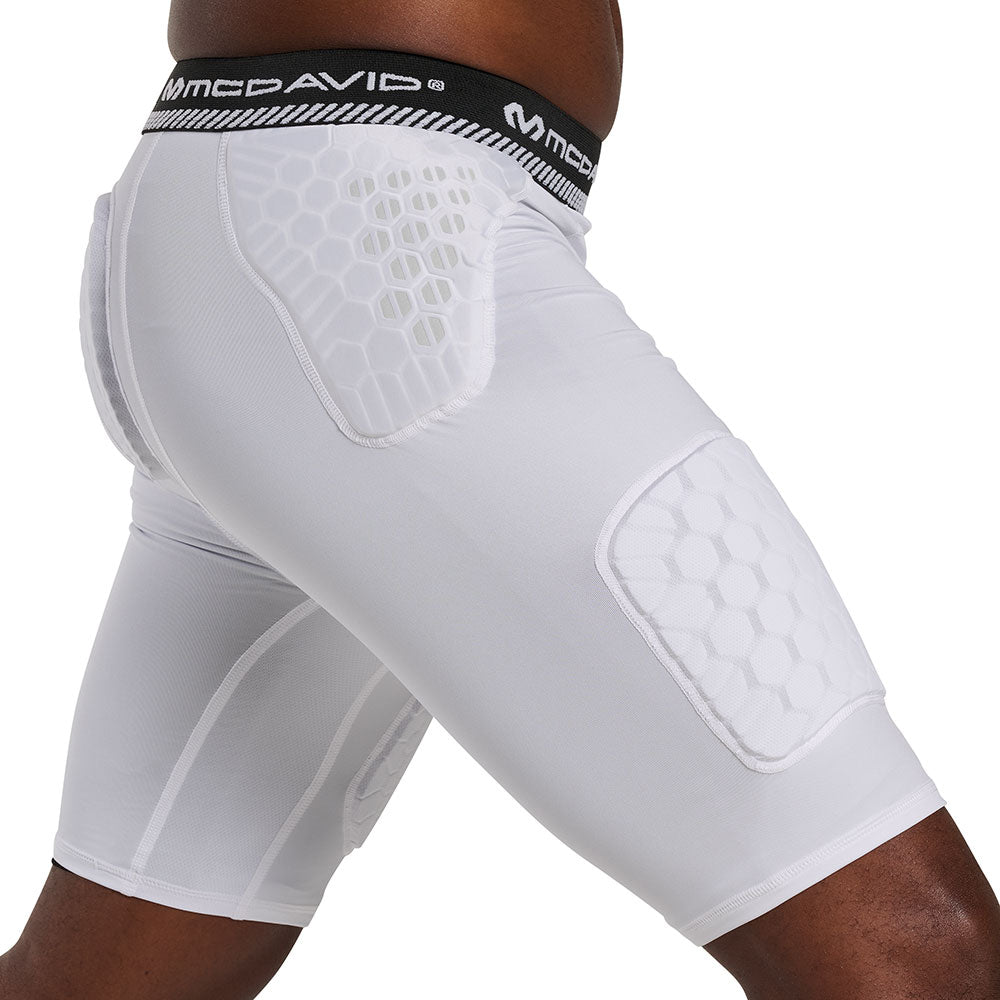 Side view of McDavid HEX® Viz 5-Pad White Short on model, showing hip and thigh pad placement