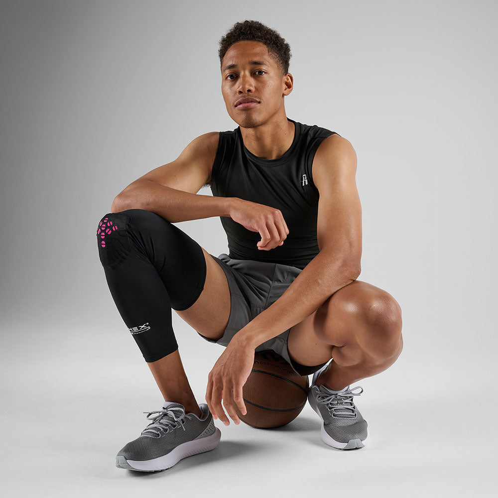 McDavid HEX Viz Leg Sleeve Single - Black/Pink - Athlete Wearing Leg Sleeve