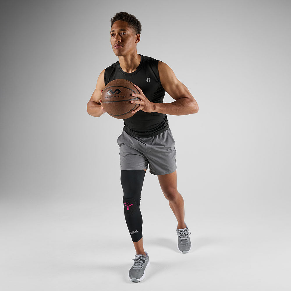 McDavid HEX Viz Leg Sleeve Single - Black/Pink - Athlete Wearing Leg Sleeve