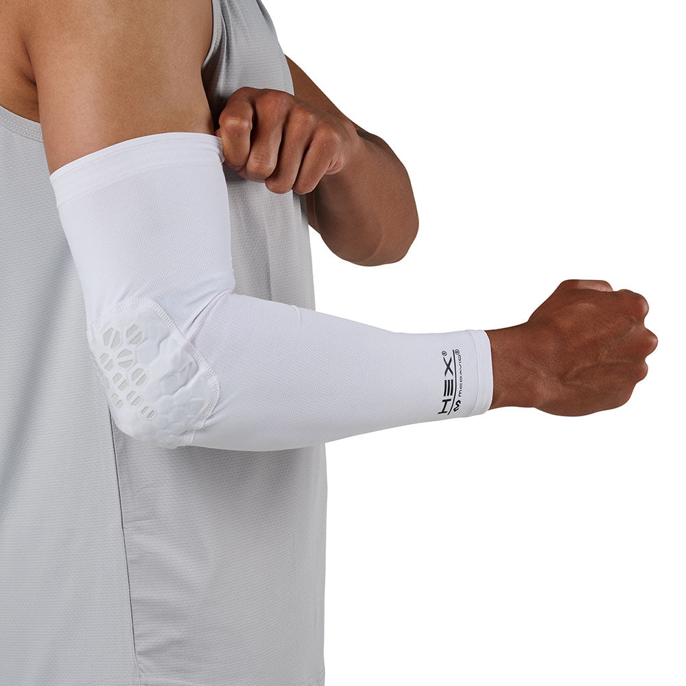 McDavid HEX Viz Arm Sleeve/Single - White/Grey - Model Wearing Arm Sleeve, Side View with Elbow Hex Pad