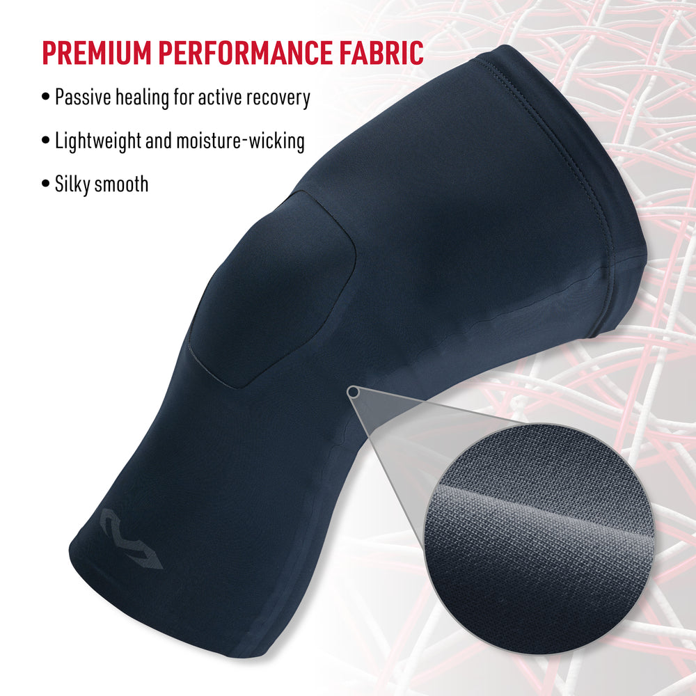 Close-up of navy Infused Buttersoft knee sleeve showing premium performance fabric with texture detail, highlighting passive healing, lightweight moisture-wicking, and silky smooth feel