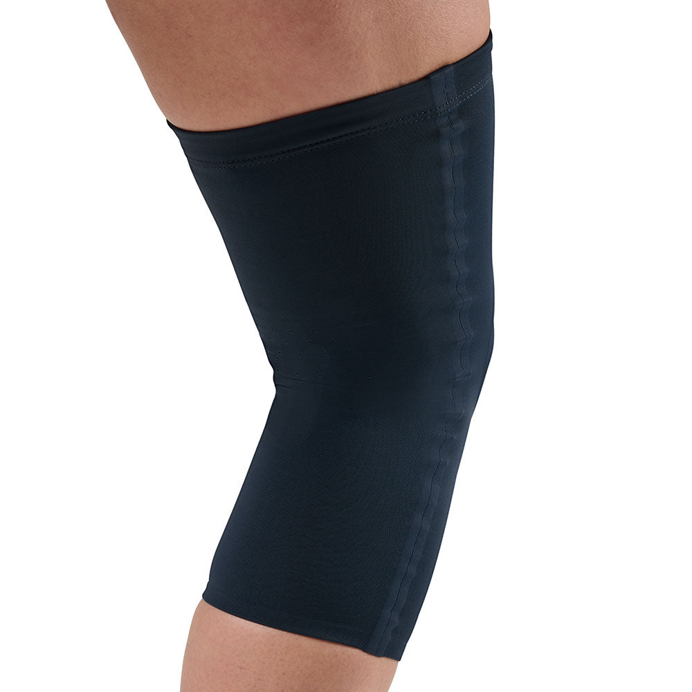 McDavid Infused Therapy Buttersoft Knee Sleeve - Knee sleeve shown on model (back view)