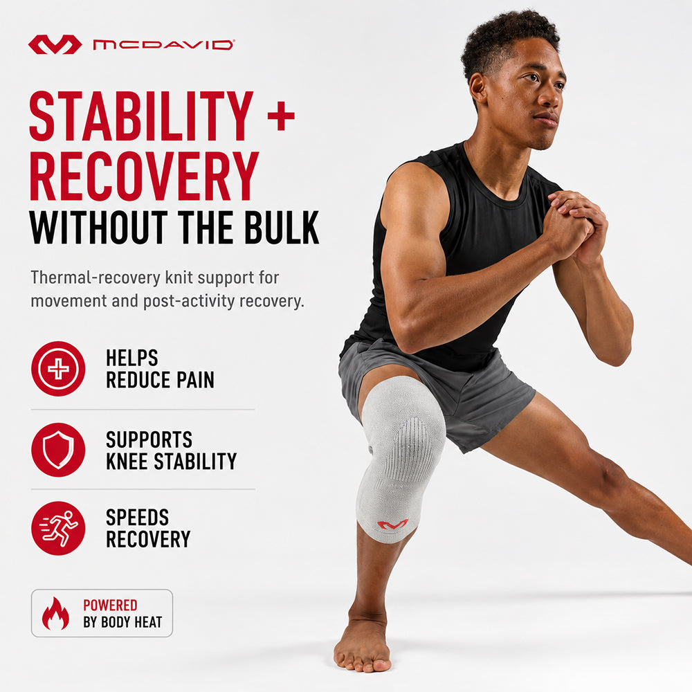 Man in a deep lunge wearing the gray McDavid Infused Therapy knee sleeve, which offers thermal-recovery support to help reduce pain, support knee stability, and speed recovery.
