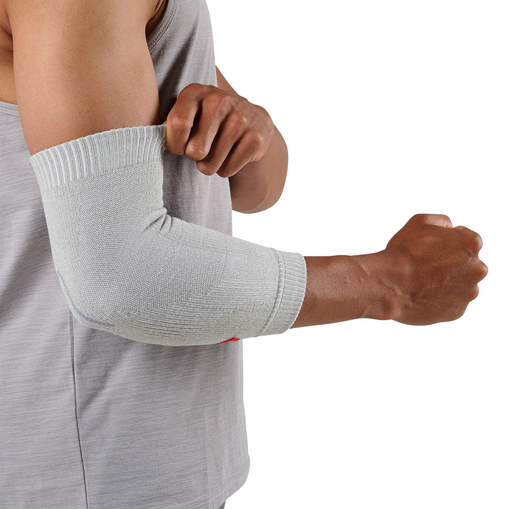 McDavid Infused Knit Elbow Sleeve - Grey- Shown on Model's Elbow