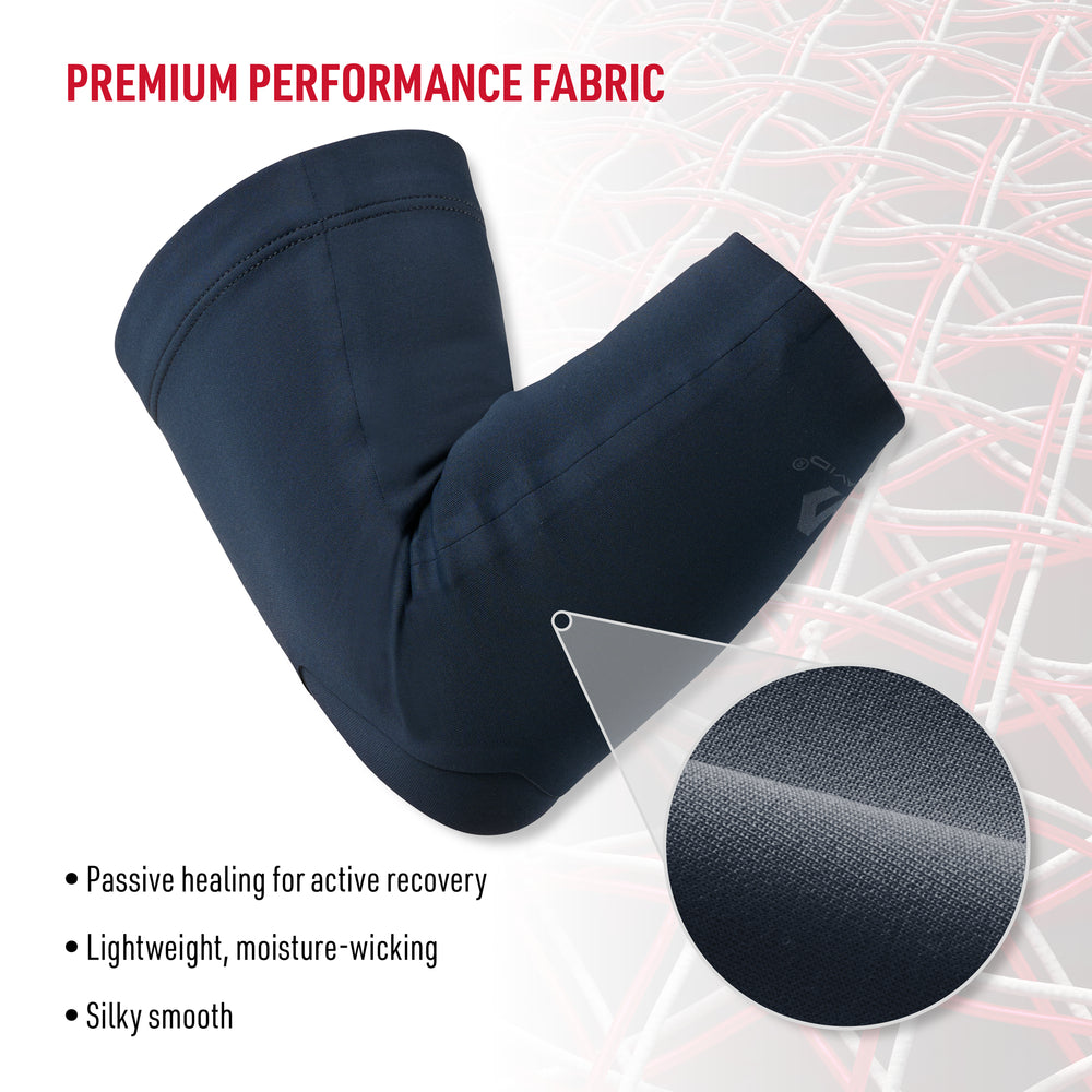 Close-up of navy Infused Buttersoft elbow sleeve showing premium performance fabric with texture detail, highlighting passive healing, lightweight moisture-wicking, and silky smooth feel