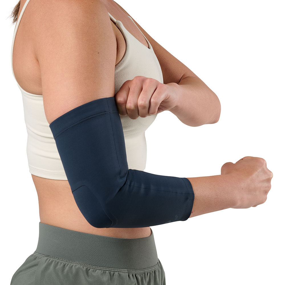 McDavid Infused Therapy Buttersoft Elbow Sleeve - Model wearing elbow sleeve