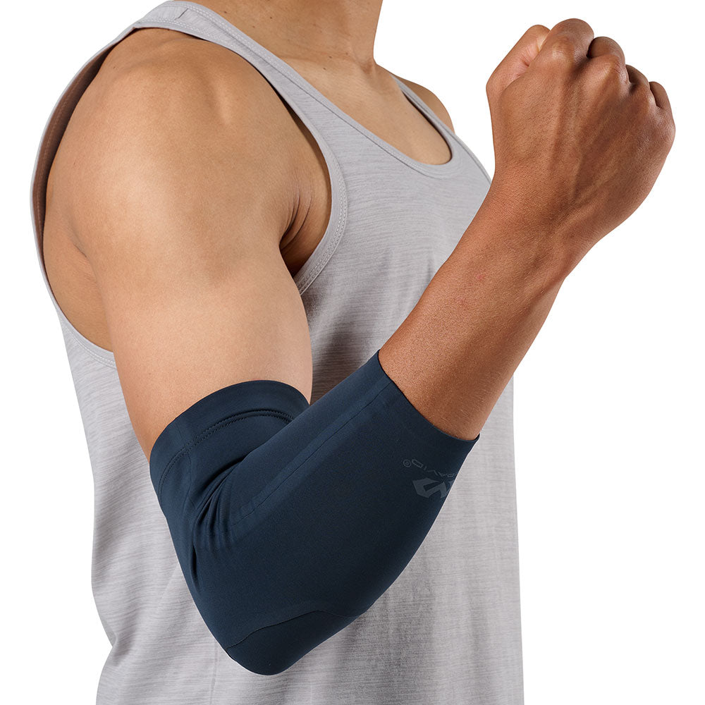 McDavid Infused Therapy Buttersoft Elbow Sleeve - Model wearing elbow sleeve