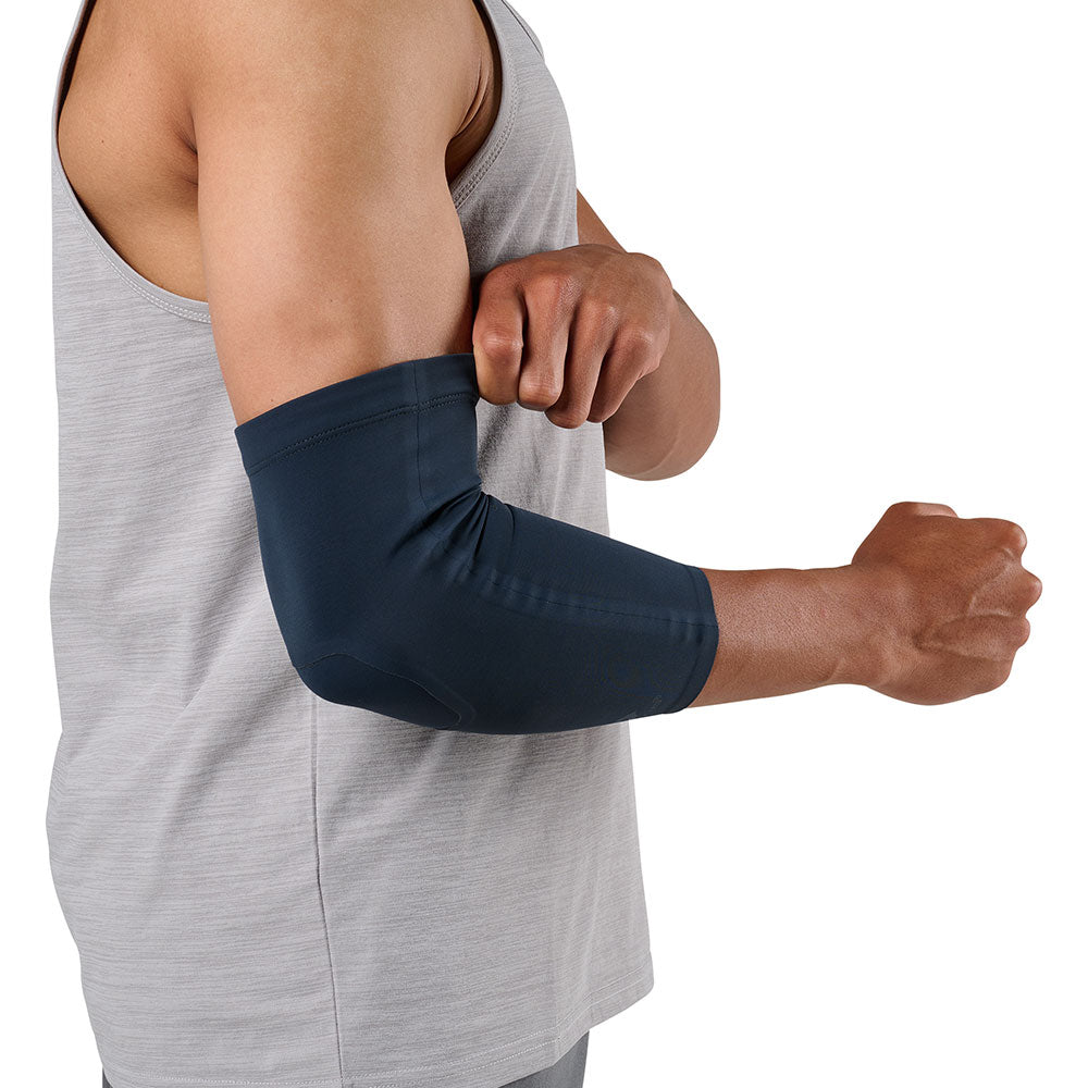 McDavid Infused Therapy Buttersoft Elbow Sleeve - Model wearing elbow sleeve