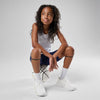McDavid Silicone Patella Band Pair - Black - Shown on Model Sitting on Basketball