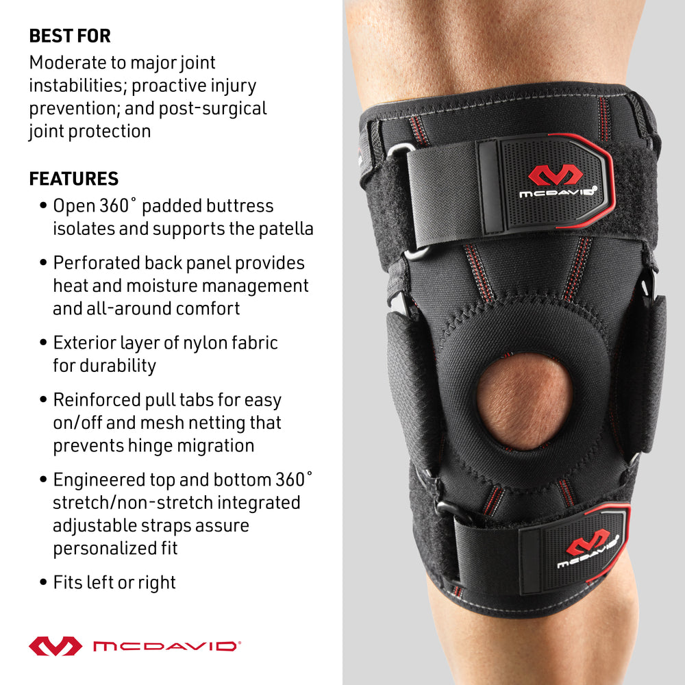 McDavid Knee Brace with Dual Disk Hinges, a black neoprene knee brace worn on a knee, featuring a 360° open patella buttress, hinged side supports, adjustable straps, and a perforated back panel