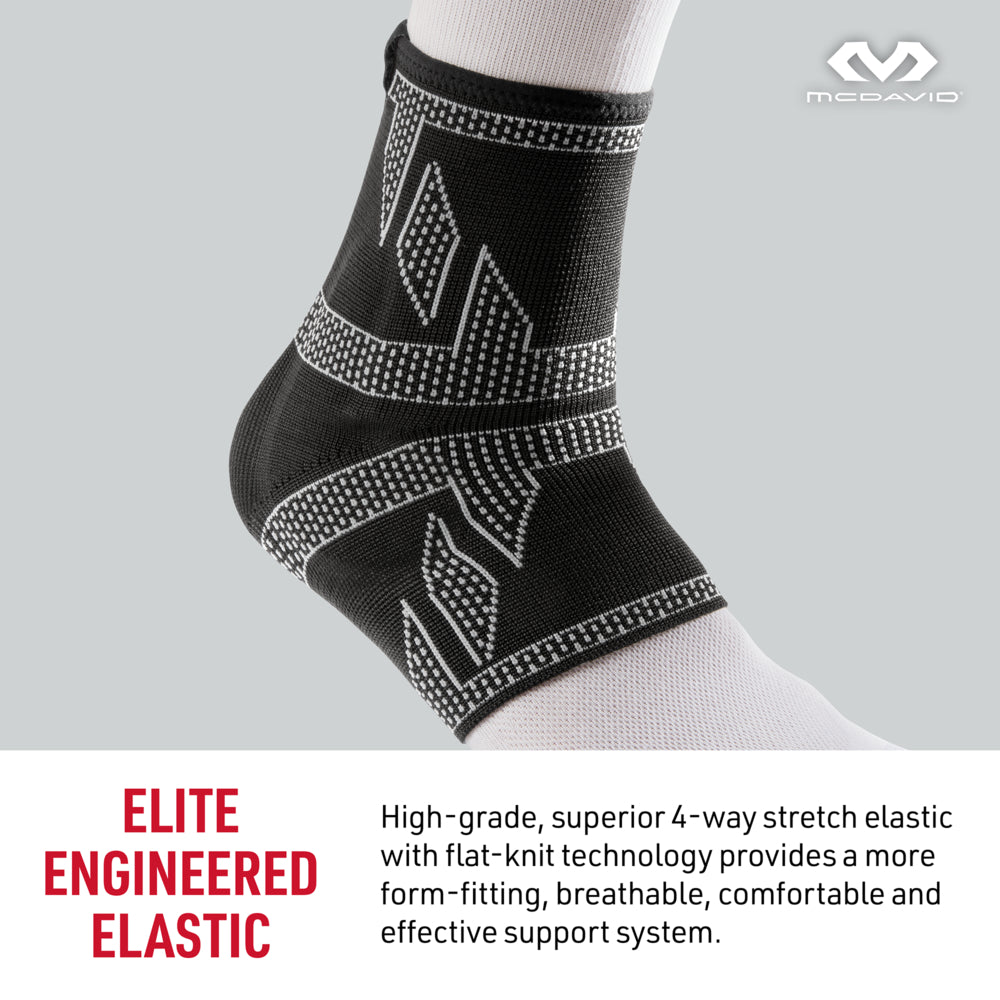 McDavid ELITE Engineered Elastic™ Ankle Sleeve featuring high-grade 4-way stretch and flat-knit construction for breathable, form-fitting compression. Designed to provide ankle support, comfort, and flexibility during sports and injury recovery. Black compression sleeve shown worn on foot.