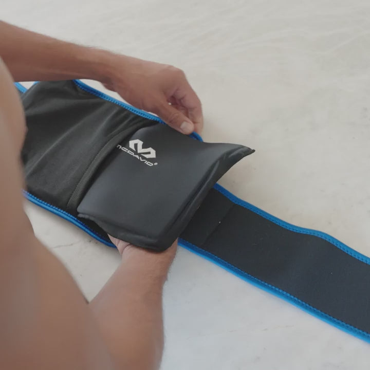 McDavid Flex Ice Therapy Back Compression Wrap applying cold therapy and compression to the lower back