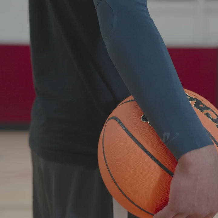 McDavid Infused Therapy Buttersoft Arm Sleeve worn on the arm, showing its soft, smooth fabric