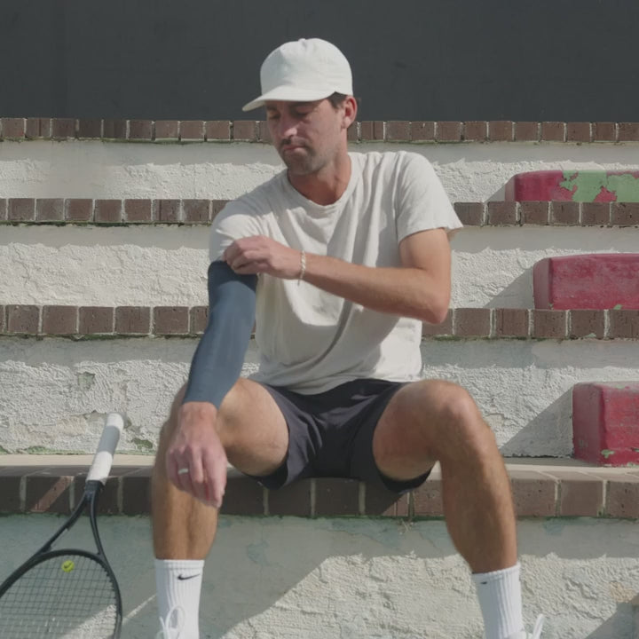 McDavid Infused Therapy Buttersoft Arm Sleeve worn on the arm, showing its soft, smooth fabric