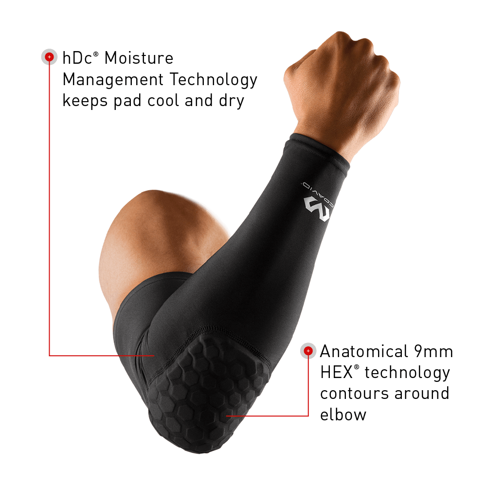 McDavid HEX® Shooter Arm Sleeve/Single – Tech Callouts: 1) hDc® Moisture Management Technology keeps pad cool and dry | 2) Anatomical 9mm HEX® Technology contours around elbow