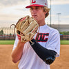 Youth Baseball Pitcher Wearing Protective HEX® High Impact Arm Sleeve