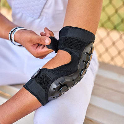 Youth Baseball Player Wearing Protective HEX® High Impact Elbow Guard - Detail View