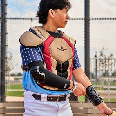 Youth Baseball Player Wearing Protective HEX® High Impact Wrist Guard and HEX® High Impact Elbow Guard