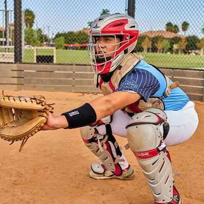 Youth Baseball Catcher Wearing Protective HEX® High Impact Wrist Guard