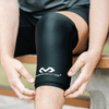McDavid Flex Ice Therapy Knee/Thigh Compression Sleeve - Lifestyle Image - Athlete Wearing Flex Ice Knee Sleeve