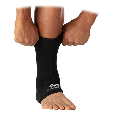McDavid Flex Ice Therapy Ankle Compression Sleeve - On Model - Sliding Compression Sleeve Over Ankle
